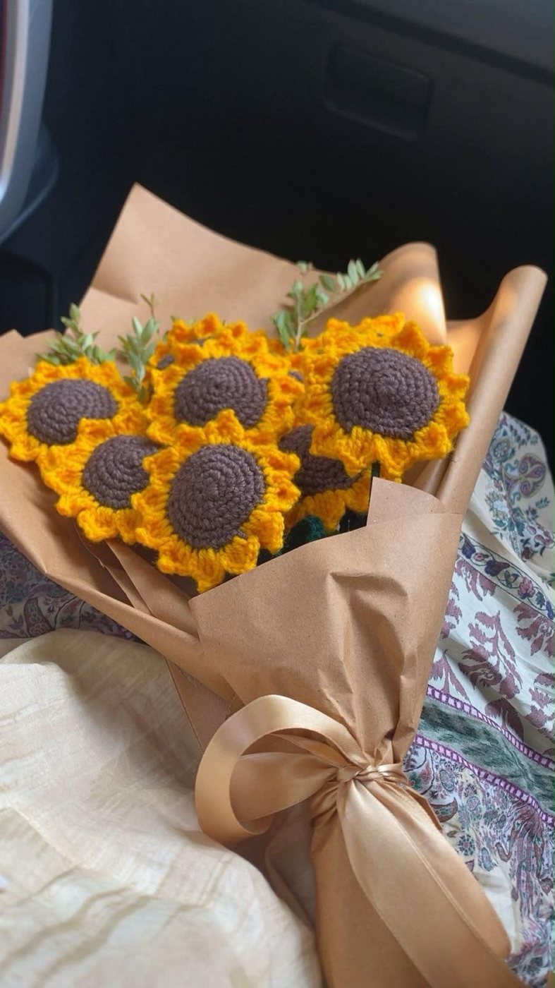 Handmade crochet sunflower bouquet wrapped in kraft paper